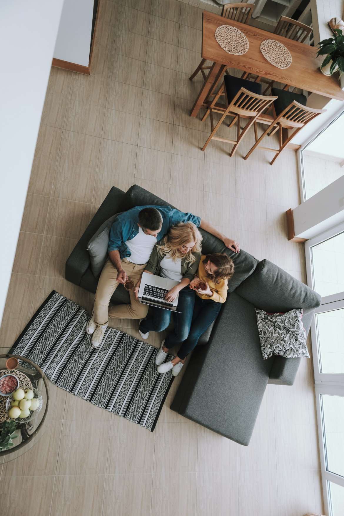 3 people on couch. view from above.